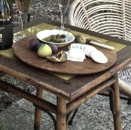 Wooden table and serving board with small dishes